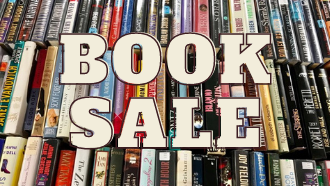 'book sale' text over image of book spines